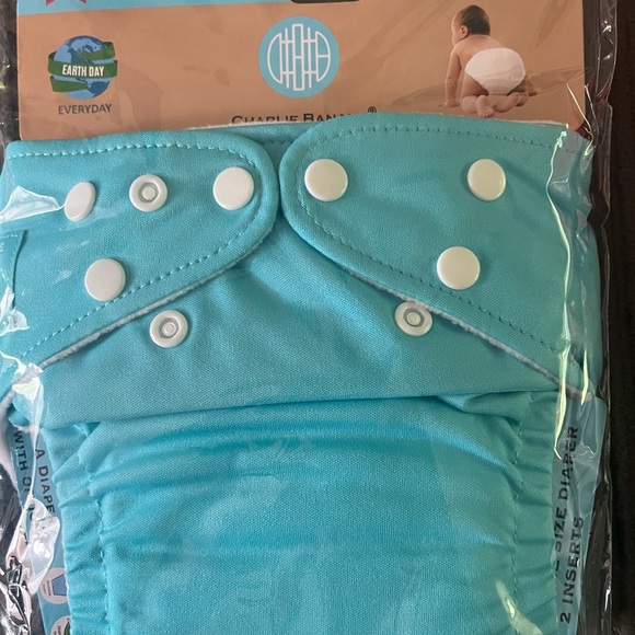 Baby reusable diapers and liners, wash clothes, diaper bag, changing pad. - Picture 6 of 8
